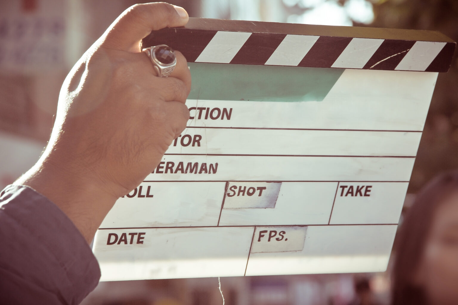 Director and crew reviewing a shot behind the scenes
